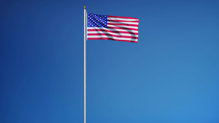 USA flag waving against clean blue sky, long shot, isolated with clipping path mask alpha channel...