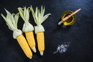 whole corn cob with oil and salt © marcin jucha