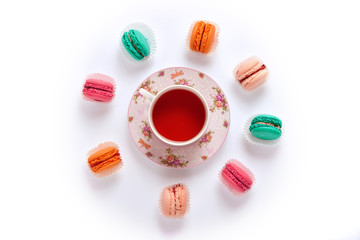 macaroon circle and tea on a white background from above