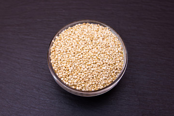 Bowl with quinoa on a slate top view from above