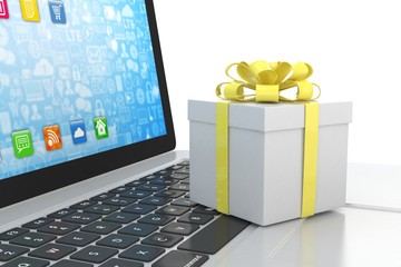 Gift box with ribbon on laptop keyboard. 3d rendering.