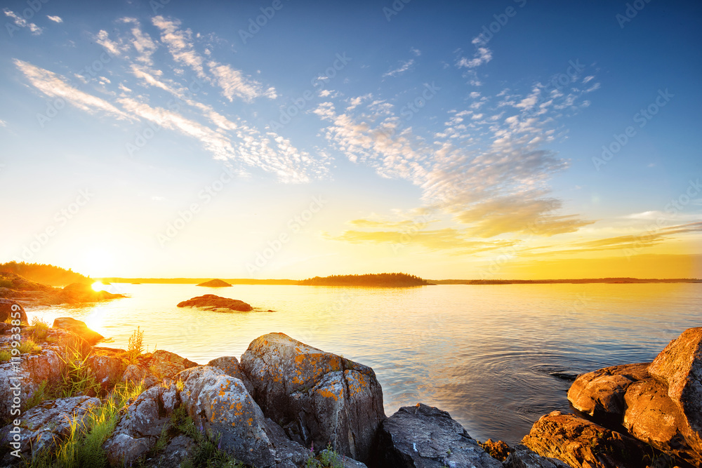 Wall mural beautiful sunset on the lake