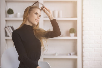 Woman daydreaming at workplace