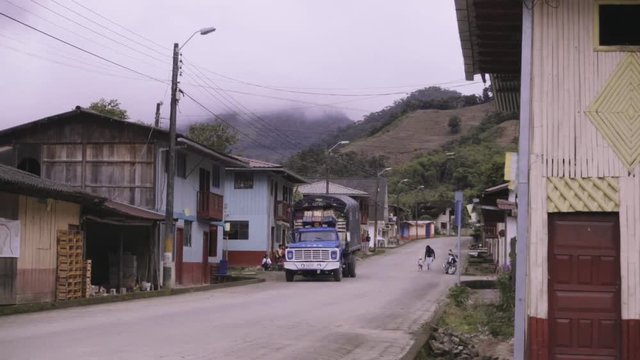 People walking on the main street of a small town of the Ecuadorian amazons 
