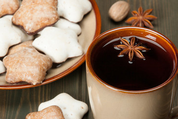 Mug Of Tea Or Coffee. Spices. Gingerbread Star Cookies With Icin