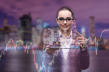 Young businesswoman in financial trading concept