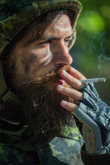 Soldier smoking cigarette
