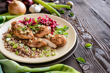 Baked chicken breast with boiled buckwheat and steamed beetroot and onion