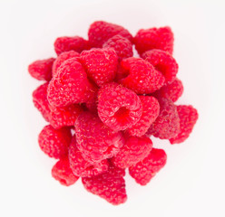 Raspberries: a stack of fruit on white background