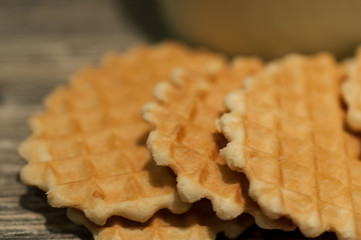 Fluted sweet biscuits and a bottle of milk