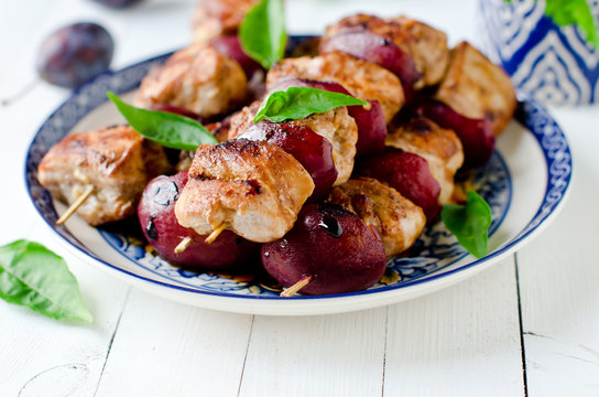 Chicken, turkey kebabs with plums