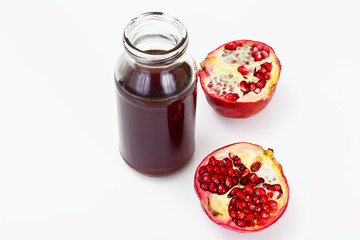 Fresh Pomegranate Juice on a Light Background