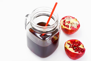 Fresh Pomegranate and Celery Juice on a Light Background