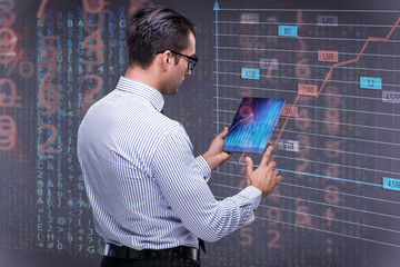 Young businessman in online trading concept