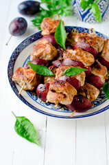 Chicken, turkey kebabs with plums