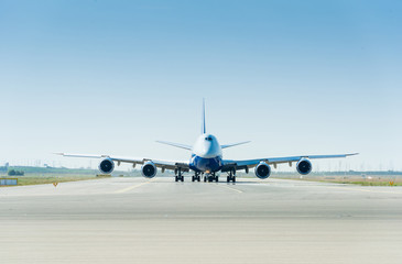 Fototapeta na wymiar Large airplane on the runway ready for takeoff