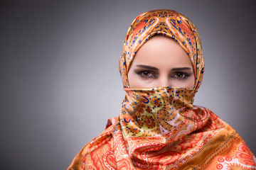 Young woman in traditional muslim clothing