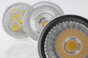 three LED GU10 bulbs with various plastic scattered light