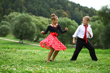 Childrens ballroom dance couple in suits - obrazy, fototapety, plakaty