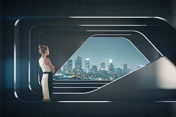 Thoughtful businesswoman in futuristic interior