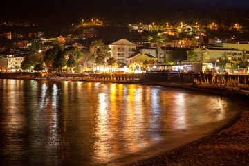 Obraz premium Beautiful night landscape of seaside town of Petrovac, Montenegr