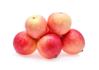 Red ripe apple with water drop isolated on white background