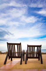 Fototapeta na wymiar Two Chairs waiting to be occupied by you in your next vacation