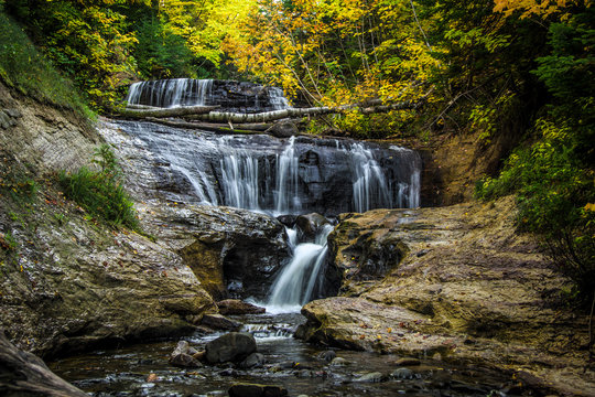 Sable Falls.  Waterfall in the Pictured Rocks National Lakeshore in Munising, Michigan. Pictured Rocks is located in the Upper Peninsula and is one of two designated national lakeshore in Michigan.