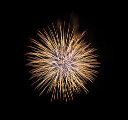 Fototapeta premium Yellow fireworks on black background