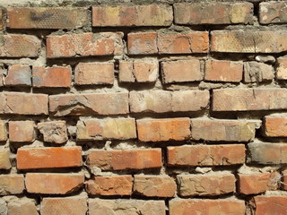 Abandoned red brick masonry grunge background