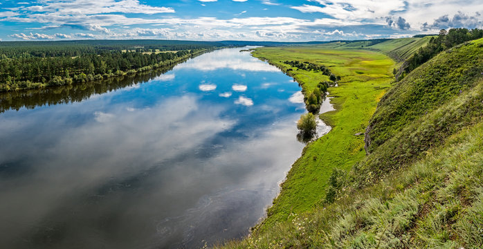 Belaya River flows through the Siberian plain