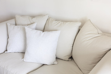 Fototapeta na wymiar Pillows on sofa Room interior Decoration background