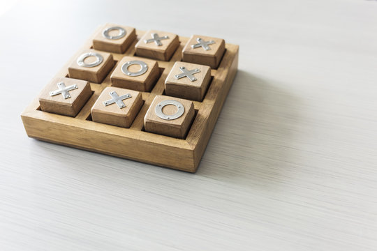 xo games tic tac toe wooden board Business Concept