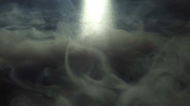 The moolight on the background of thick smoke. Slow motion capture