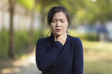 Woman Has Sore Throat