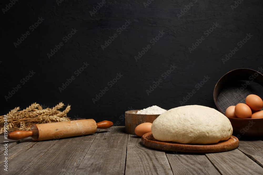 Leinwandbilder dough on table with space for an object in bakery