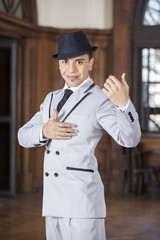 Confident Man Smiling While Performing Tango