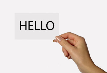 Blank card in woman hand isolated on white background