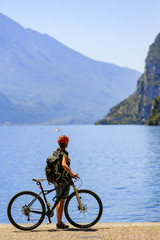 Mountain biking on Lake Garda, Riva del Garda, Italy. Amazing view of Lake Garda.