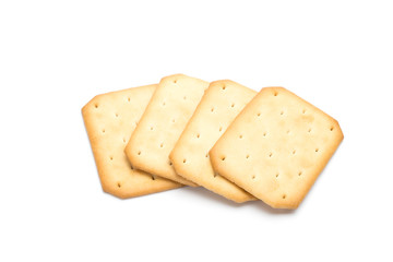 Crackers stacked isolated over white background