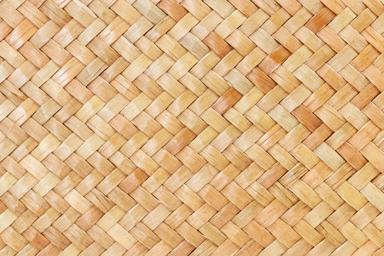 traditional thai style pattern nature background of brown handicraft weave texture bamboo surface for furniture materia