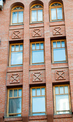 Fototapeta premium Красивые части зданий кона балконы кирпич текстура архитектура 