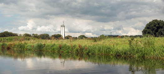 Old dutch factory seen from river the Berkel. Achterhoek. Gelder