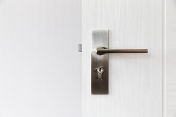 Metal door handle.