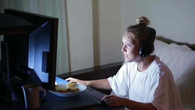 young woman playing video games on your computer. rabid gamer. I lost the game