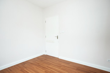 Empty room with white wall.