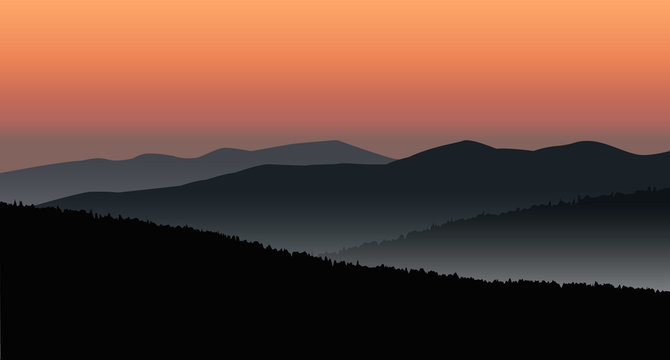 Panorama of mountains. Silhouette of mountains and coniferous trees on the background of colorful sky.