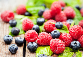 Fresh organic ripe raspberry and blueberry