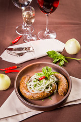 sausage with onion and basil