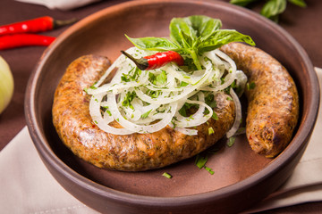 sausage with onion and basil